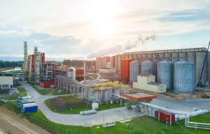 Beautiful sunset over the modern biofuel factory