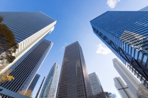 tall buildings against a bright blue sky